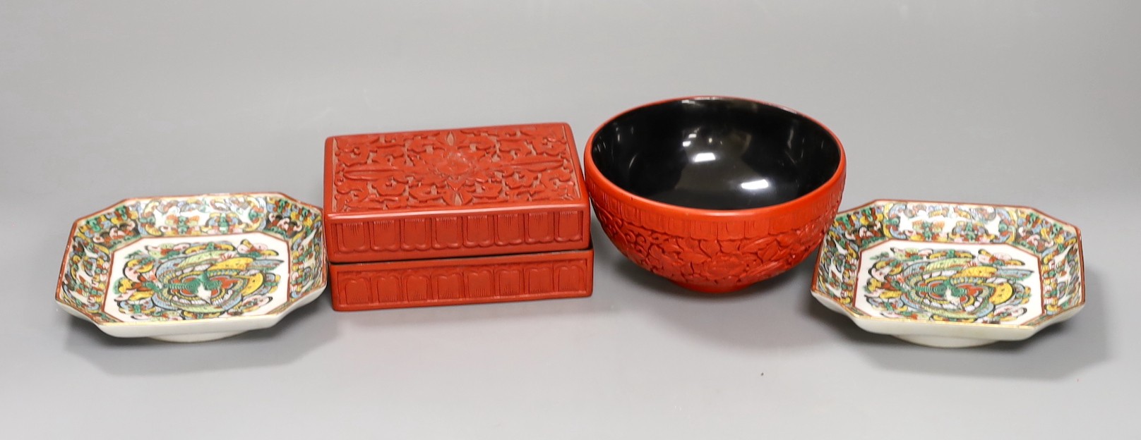 A Chinese cinnabar lacquer bowl, a similar box and cover and two Chinese famille verte thousand butterfly dishes